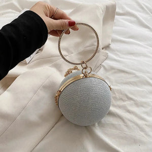 Clutch Redonda com 2 Alças – Bolsa de Tecido Brilhoso com Detalhes Metálicos